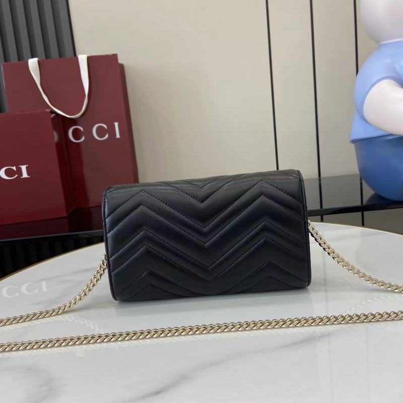 Черная сумка-клатч Gucci с цепочкой