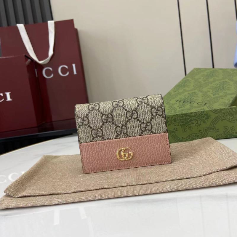 Портмоне Gucci с монограммой и логотипом GG