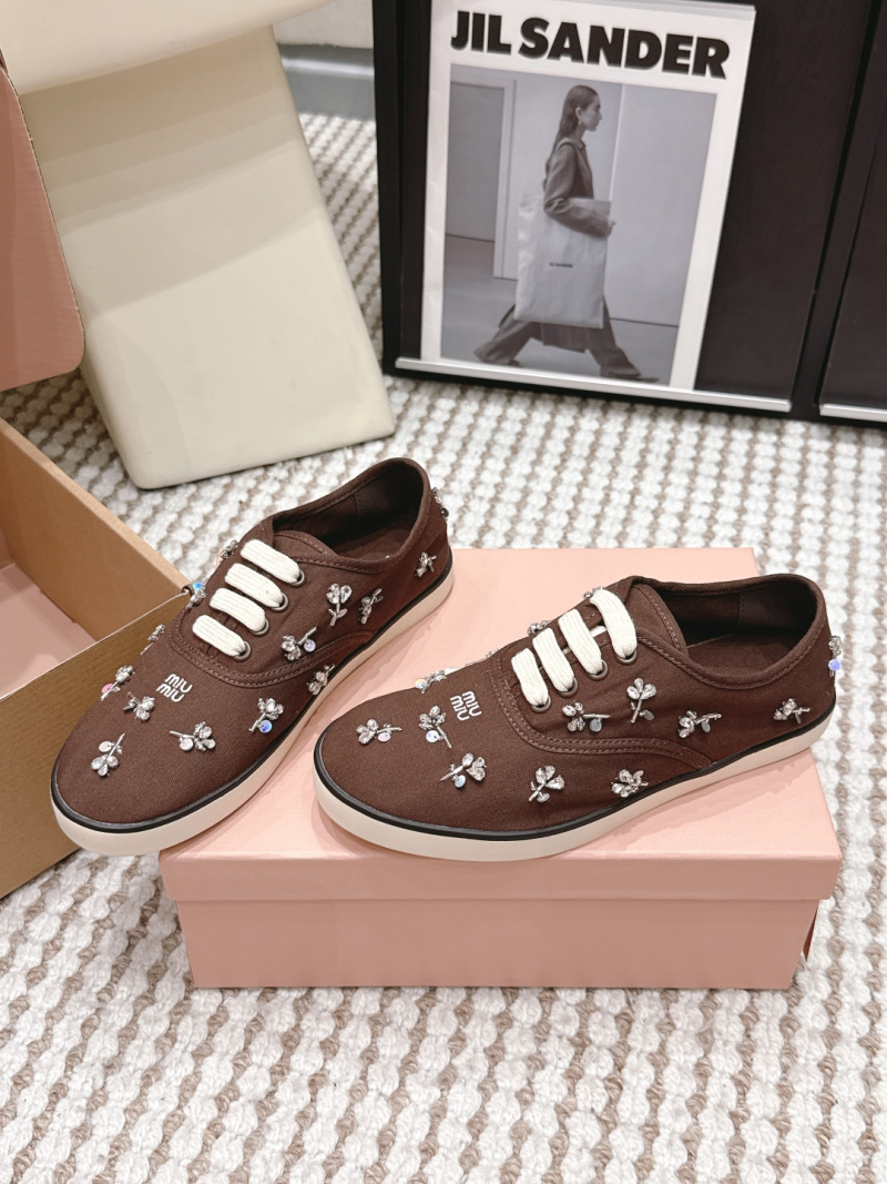 Кроссовки с цветочной вышивкой и стразами Miu Miu