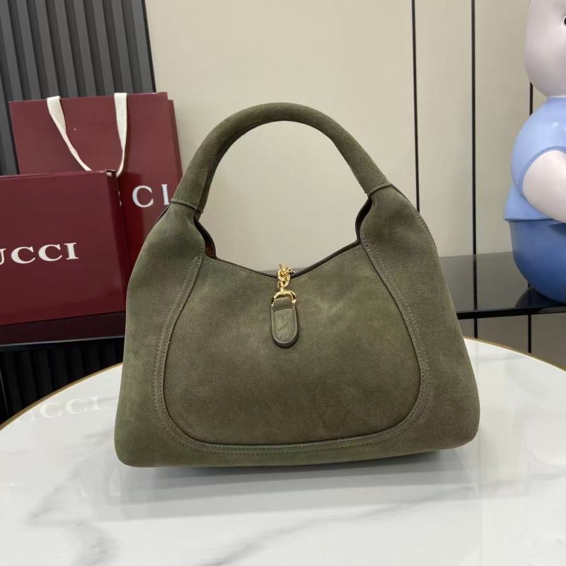 Сумка Gucci из замши с металлической фурнитурой