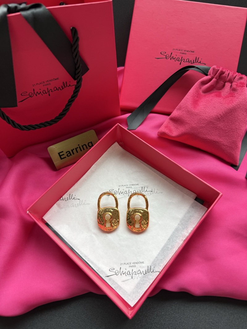Серьги в форме замков Schiaparelli