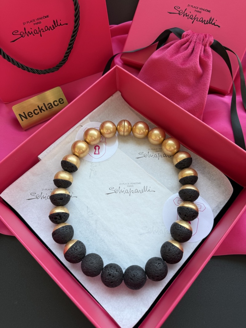 Колье из черных и золотых бусин Schiaparelli