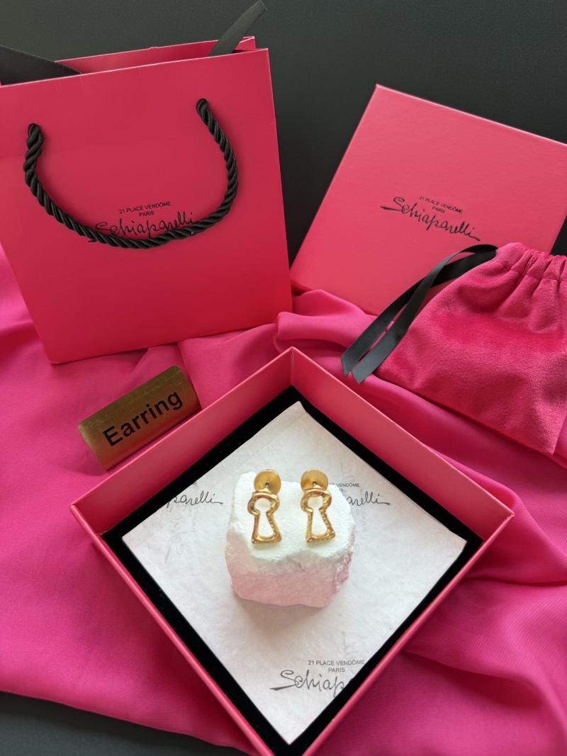 Серьги в форме ключа Schiaparelli
