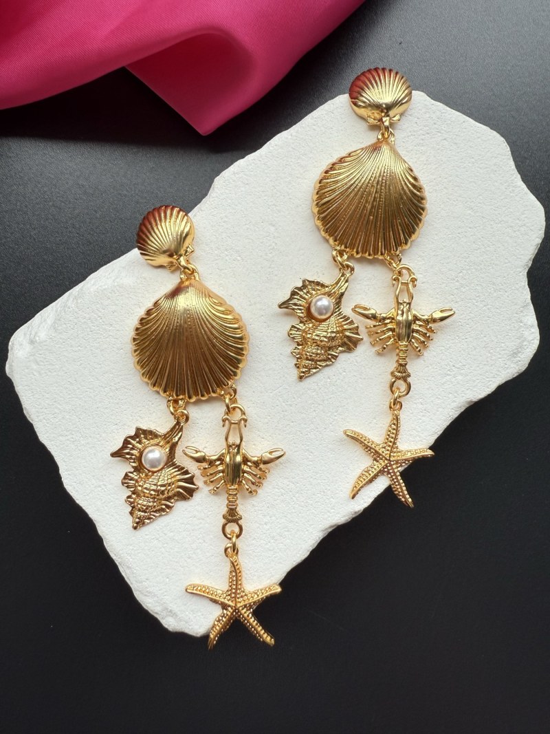 Золотистые серьги с морскими мотивами Schiaparelli
