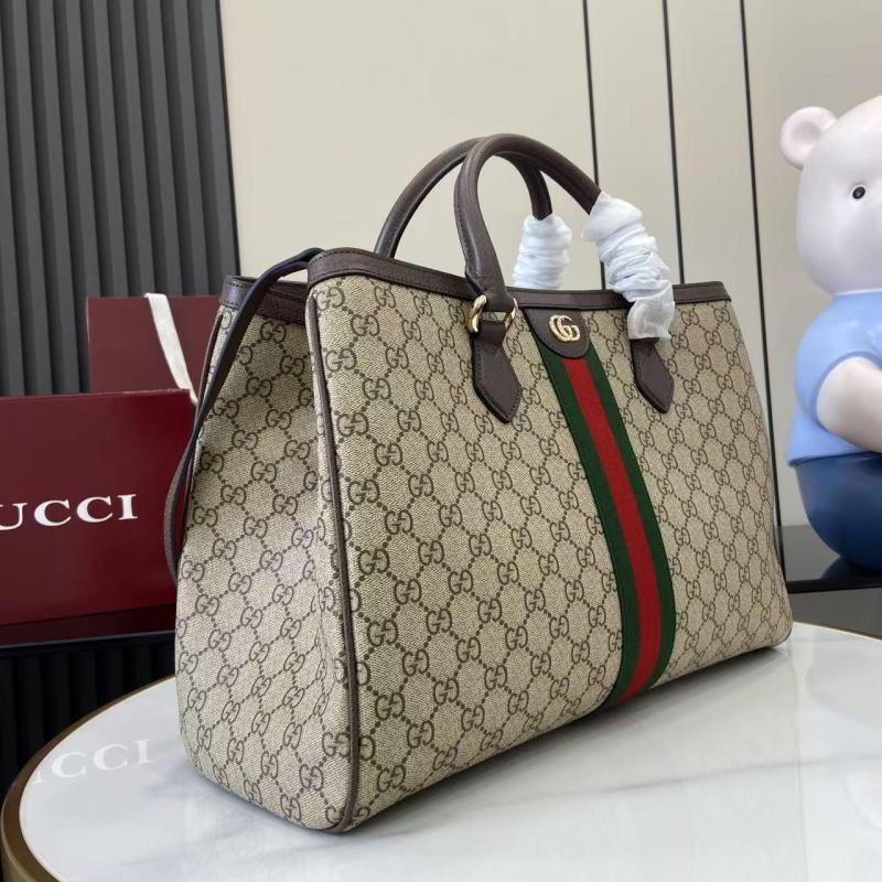 Сумка Gucci с монограммой и полосой