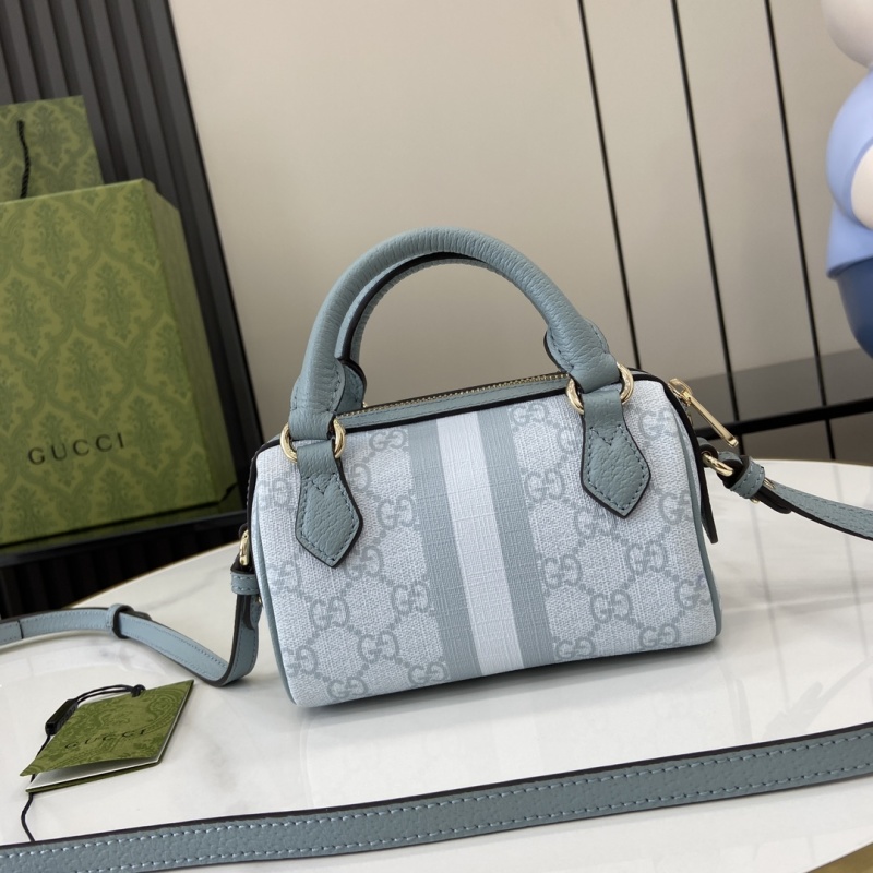 Сумка Gucci с монограммой и ручкой