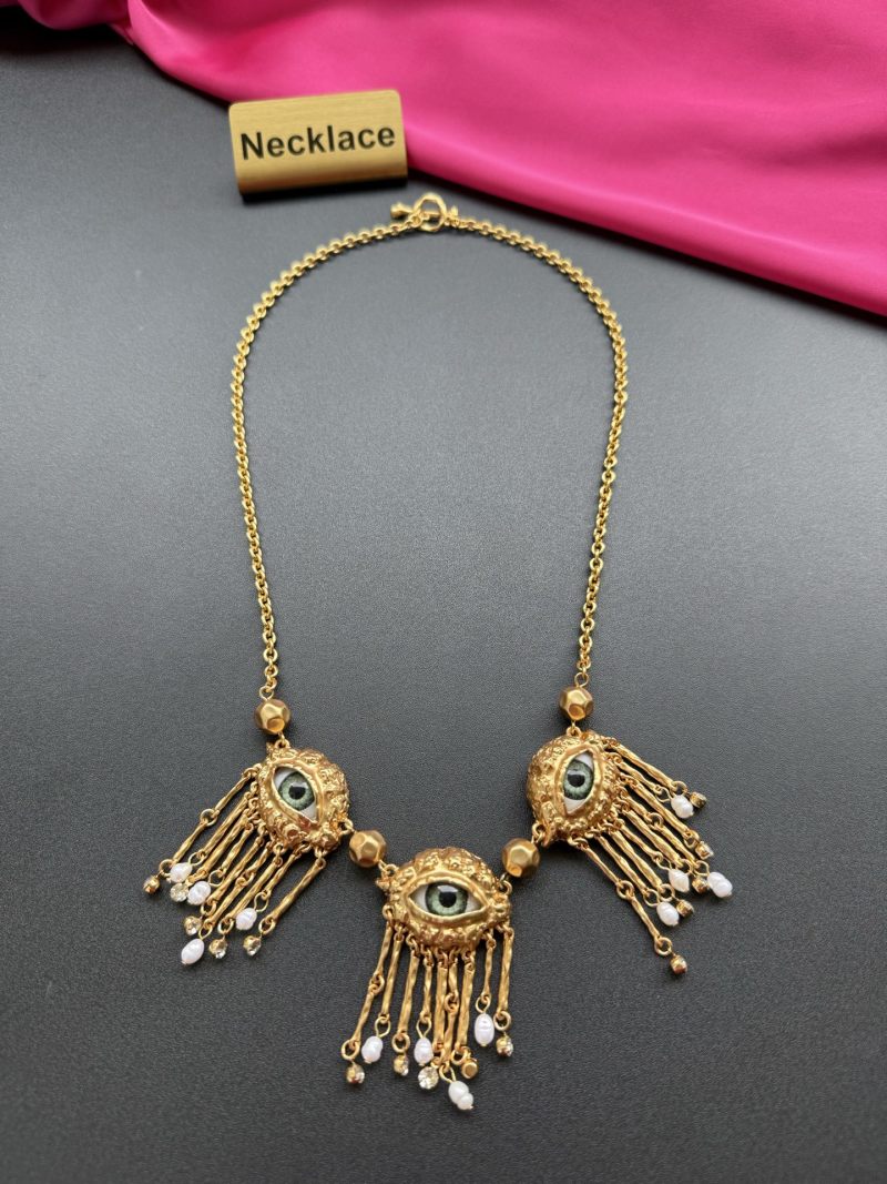 Нарядное колье с глазами и бусинами Schiaparelli