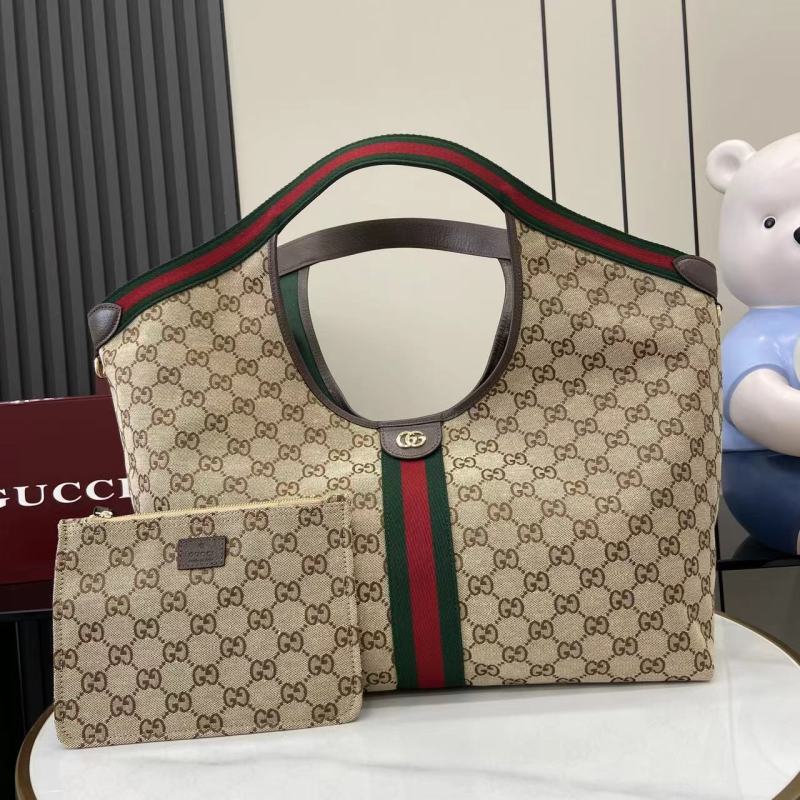 Сумка Gucci с монограммой и косметичкой