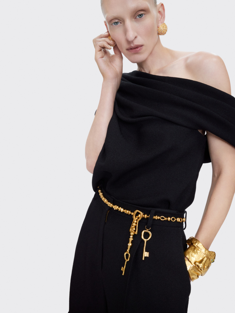 Золотистое кольцо с лицом и глазом Schiaparelli