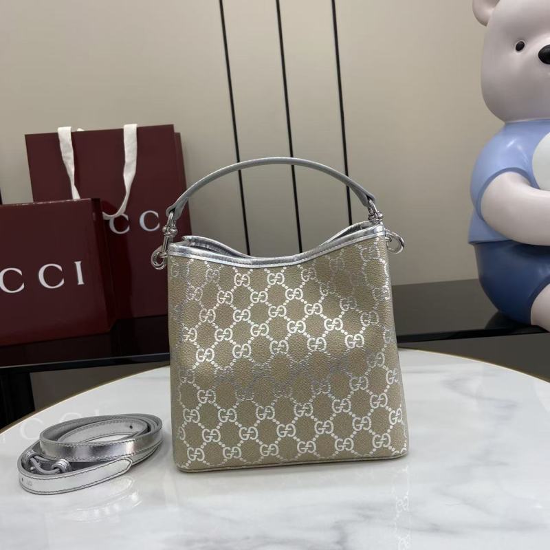 Сумка Gucci с монограммой и ручкой