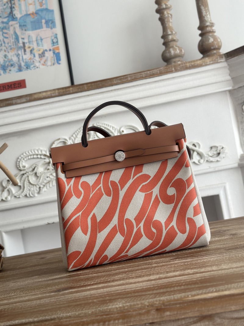 Сумка из ткани с кожаным декором и металлическим замком Hermès