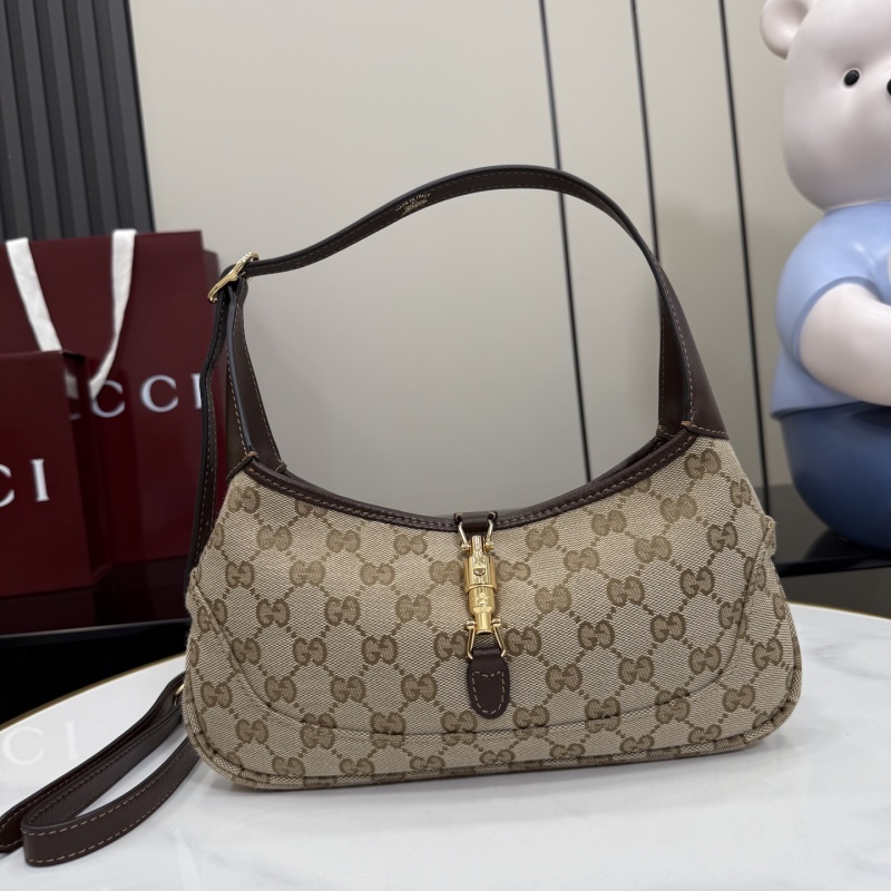 Сумка Gucci с монограммой и замком