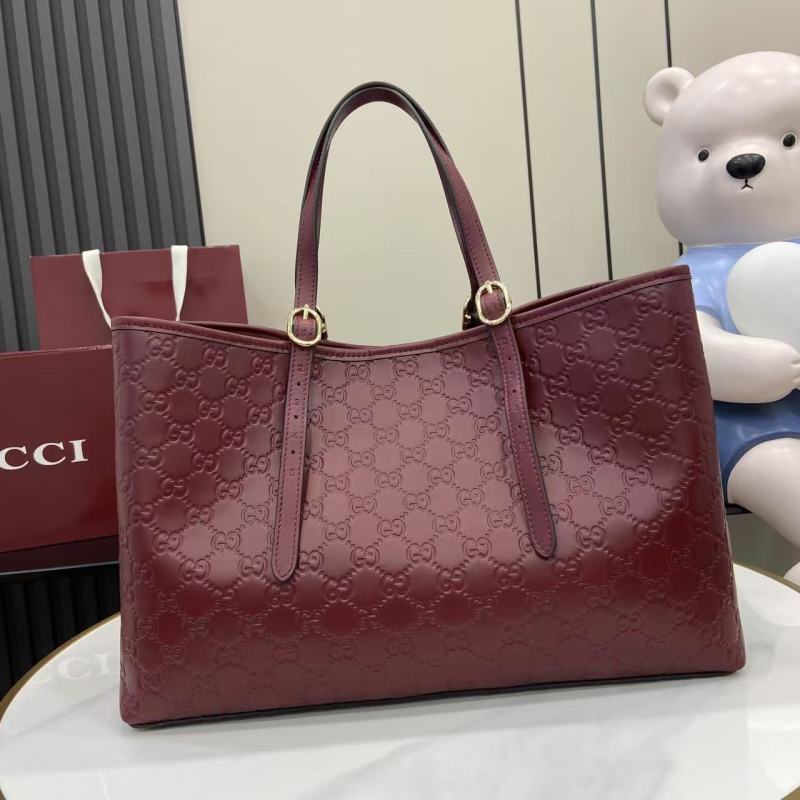 Сумка-тоут Gucci бордовая с тиснением