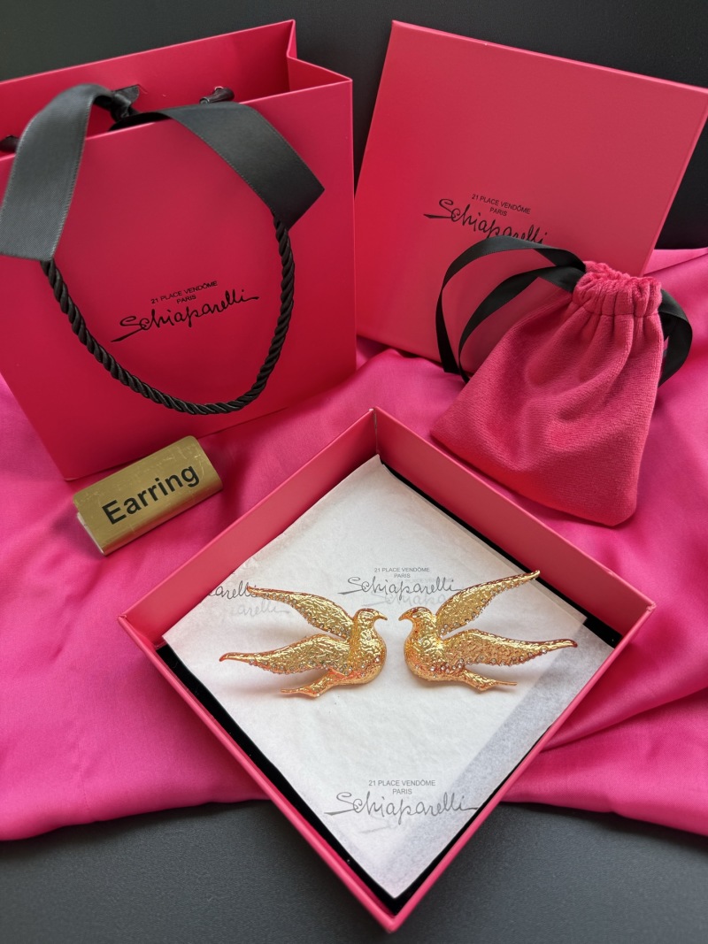 Брошь в виде двух птиц Schiaparelli