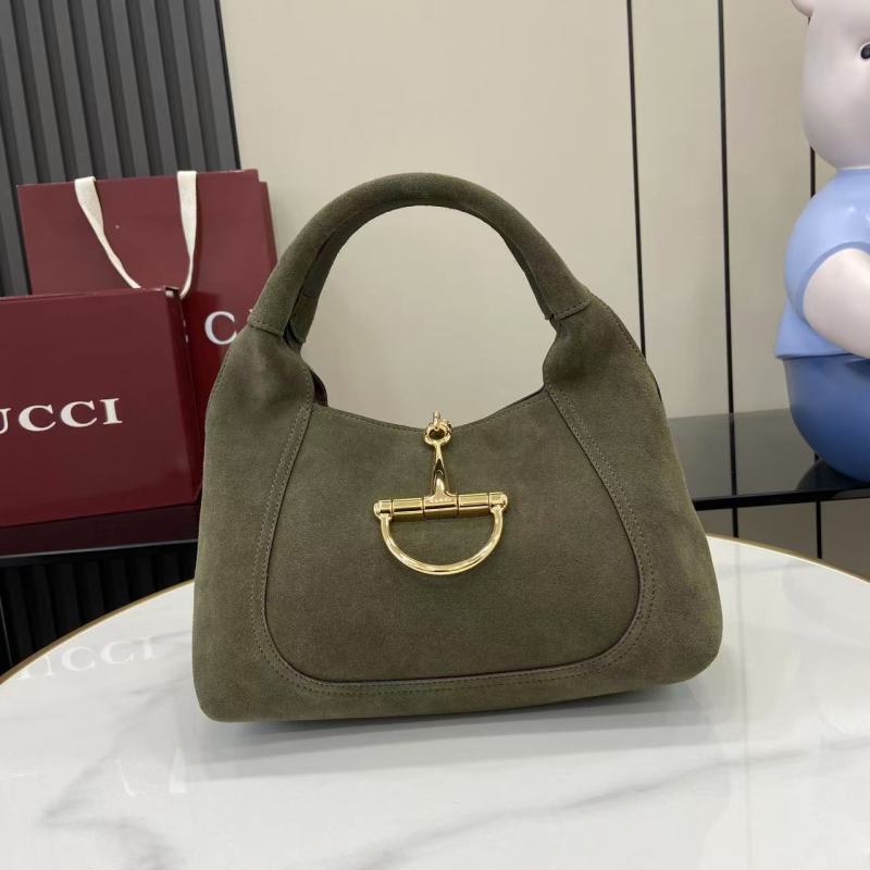Сумка Gucci из замши с металлической фурнитурой