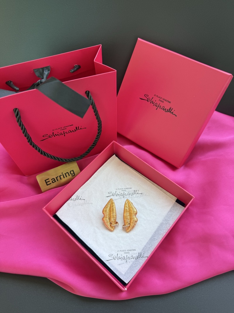 Серьги Schiaparelli в виде губ с кристаллами