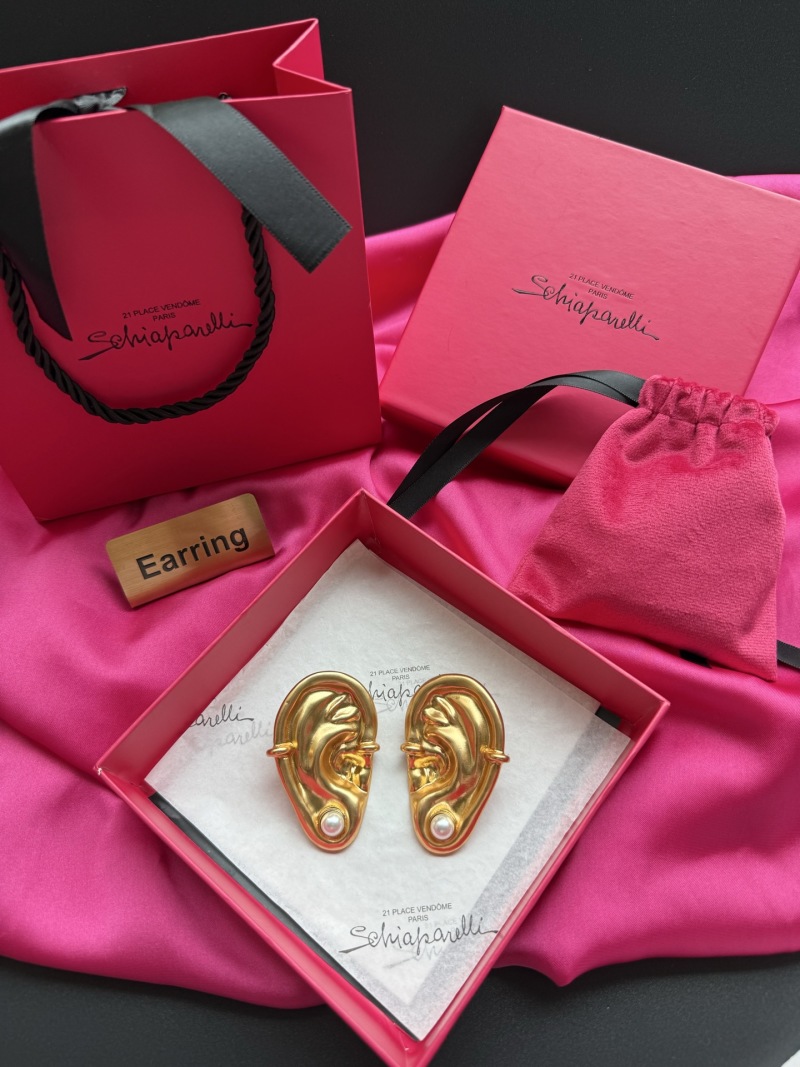 Серьги в форме уха с жемчугом Schiaparelli