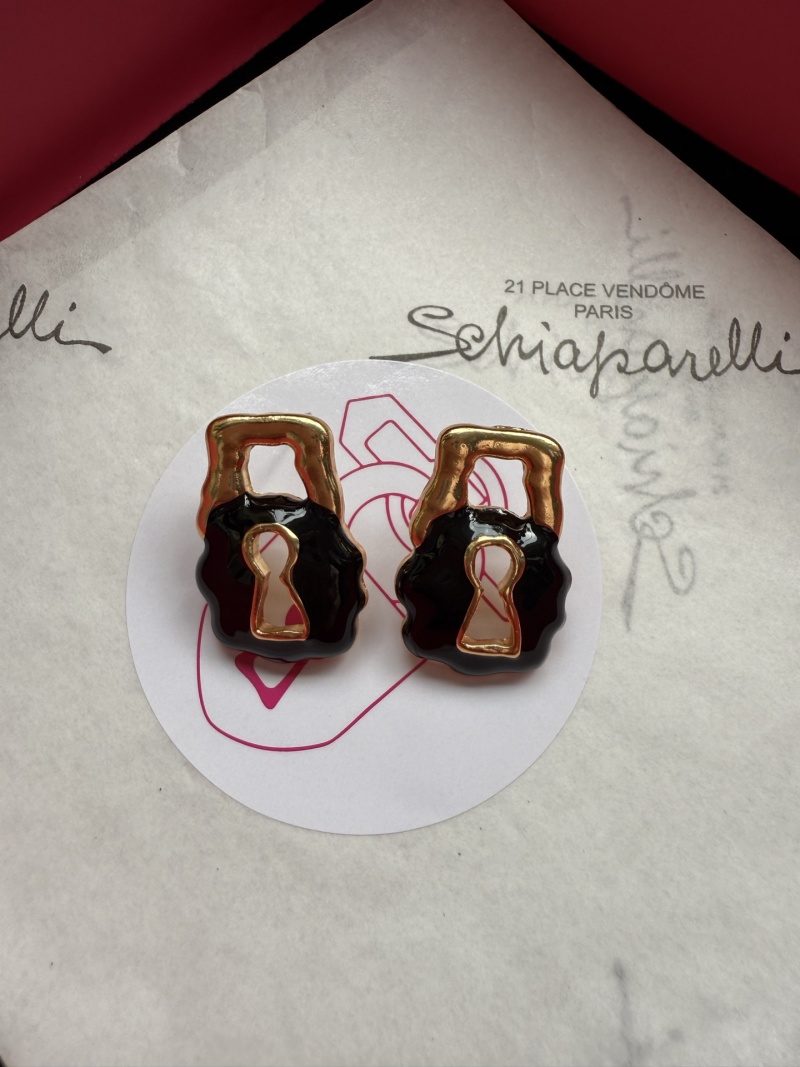 Серьги в виде замков Schiaparelli