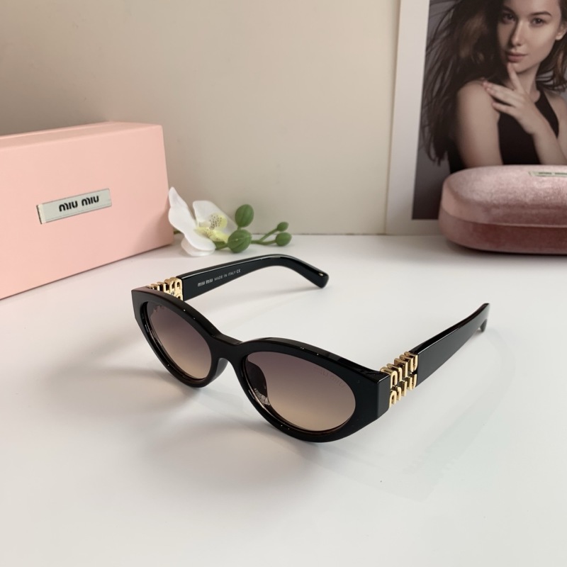 Солнцезащитные очки Miu Miu с золотистым декором