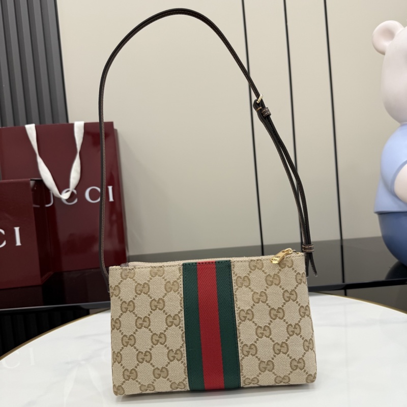 Сумка-клатч Gucci с монограммой и ремешком