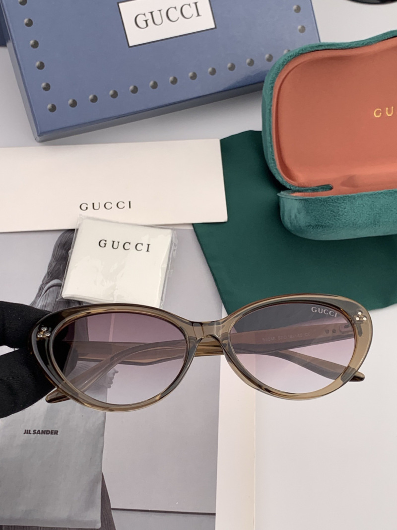 Солнечные очки с узкой оправой и декором Gucci