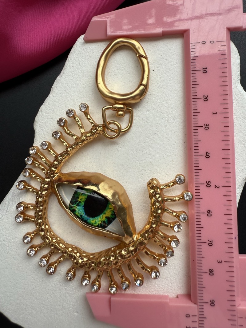 Подвеска Schiaparelli в виде глаза
