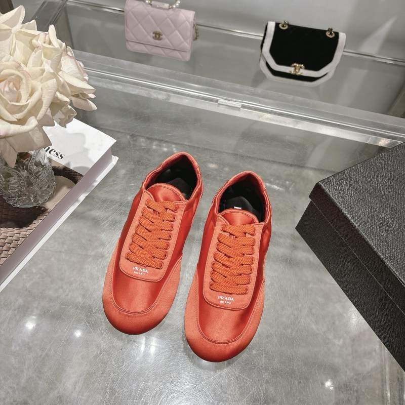Женские кроссовки Prada оранжевые