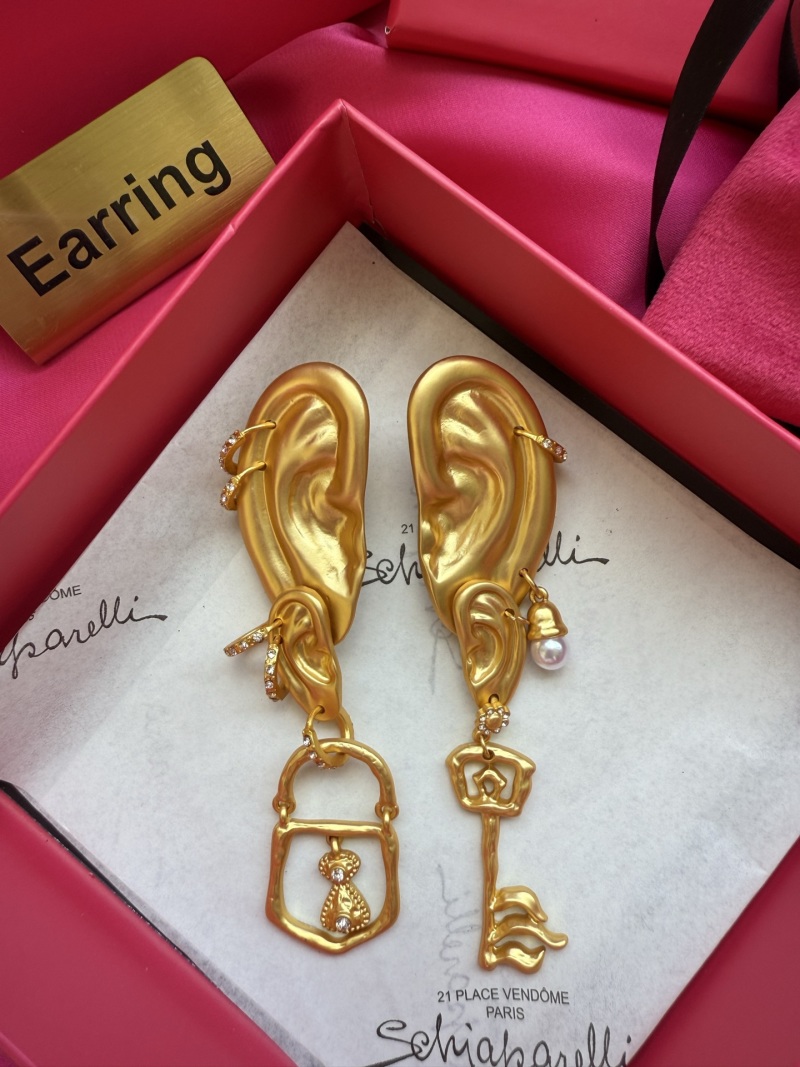 Серьги в форме уха с ключом и замком Schiaparelli