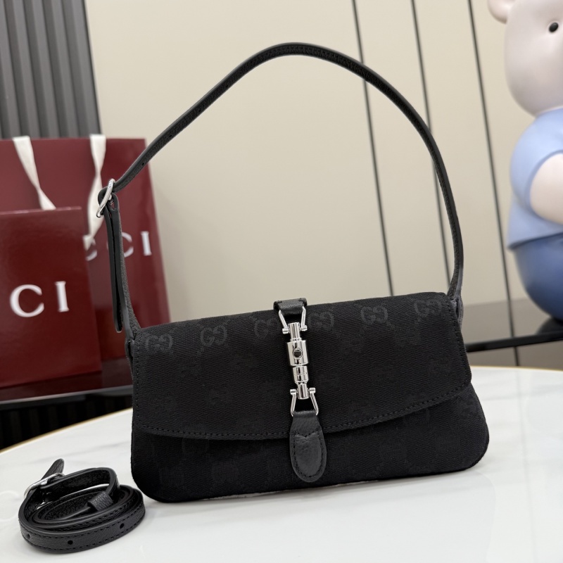 Черная сумка Gucci с монограммой