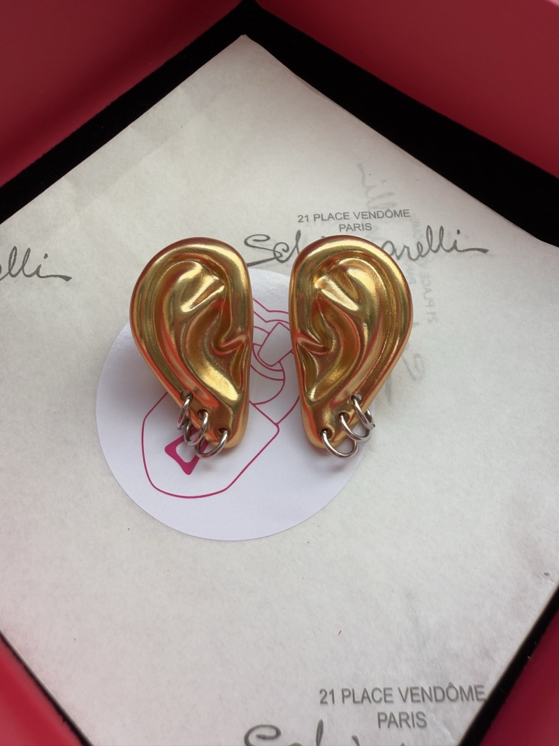Серьги в форме уха Schiaparelli