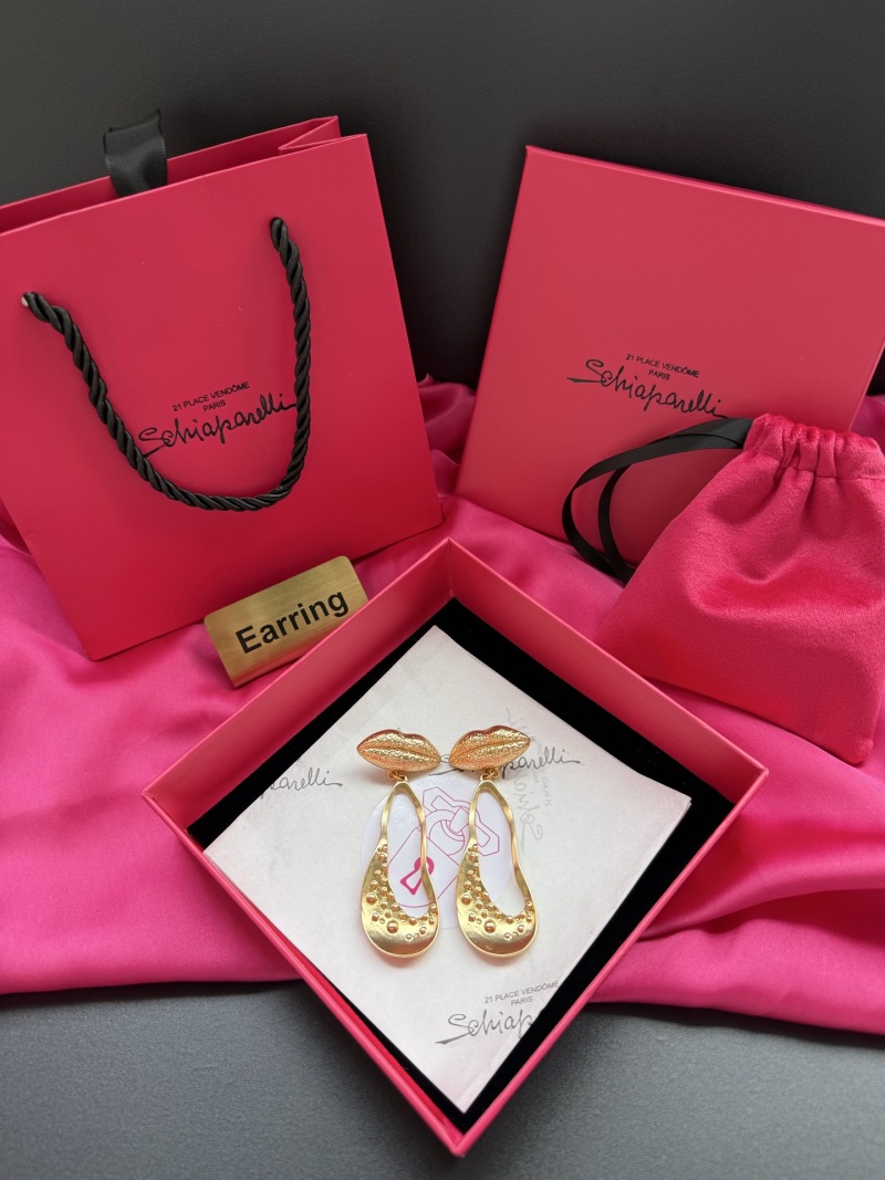 Золотистые серьги в форме губ Schiaparelli