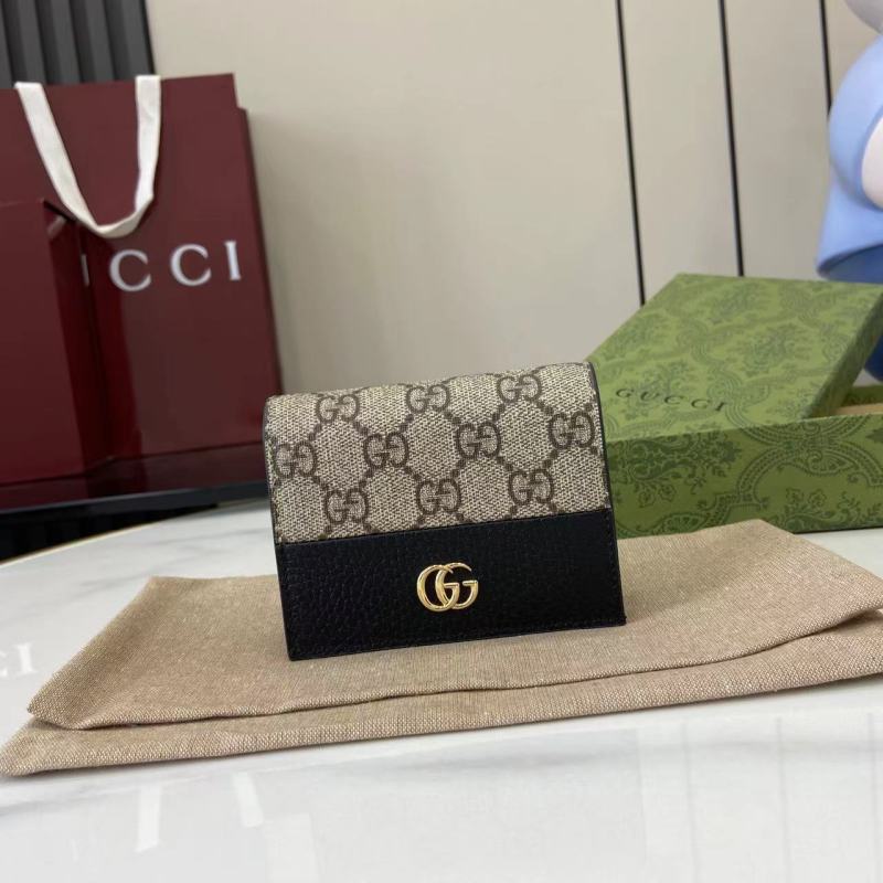 Портмоне Gucci с монограммой и замком GG