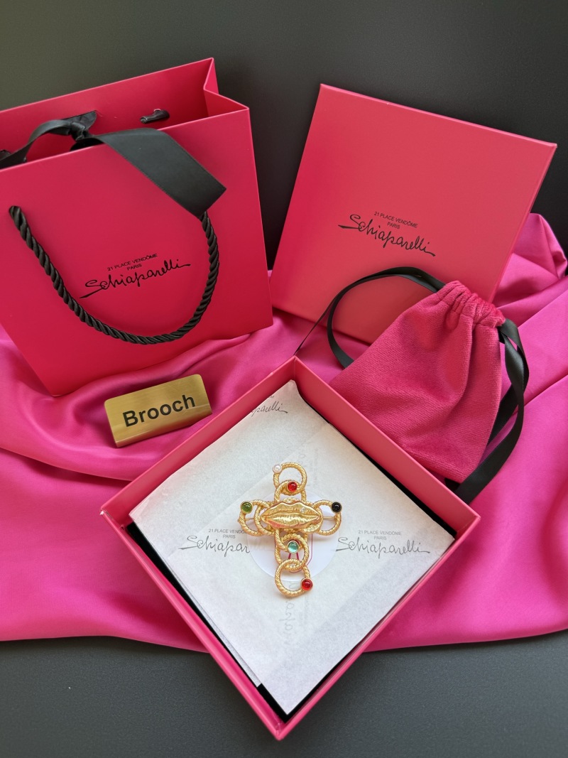 Брошь Schiaparelli