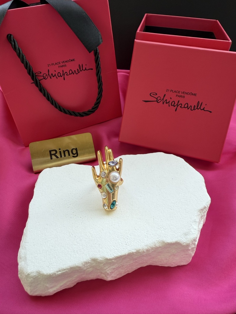 Кольцо в виде руки с камнями Schiaparelli