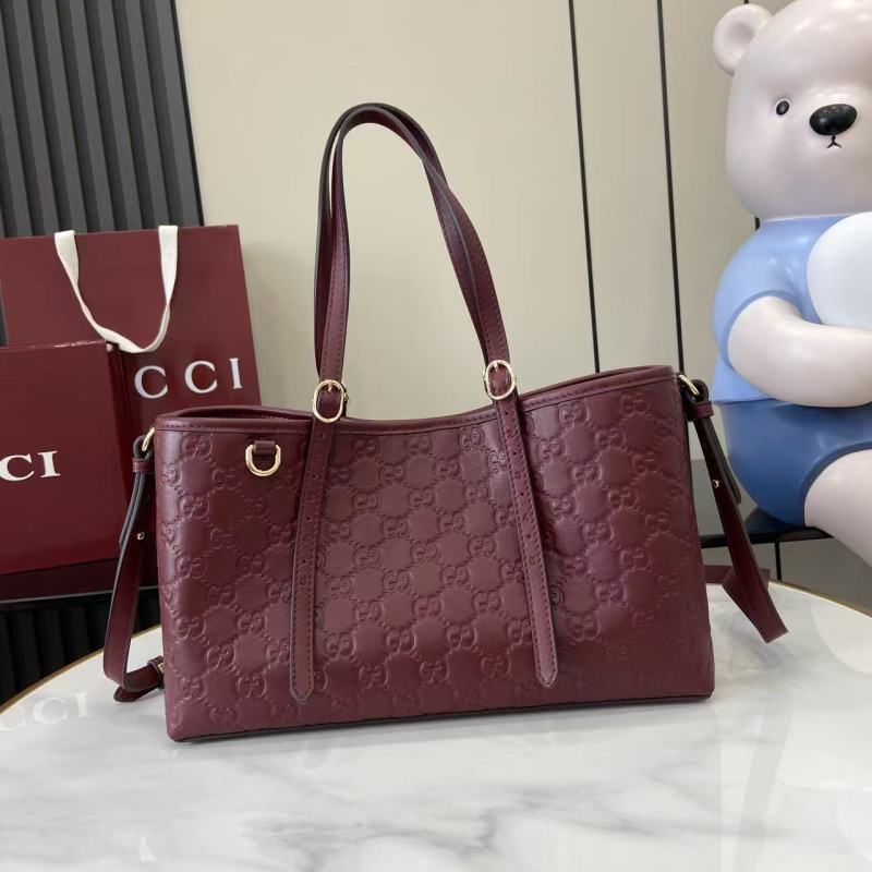 Сумка-тоут Gucci бордовая с тиснением