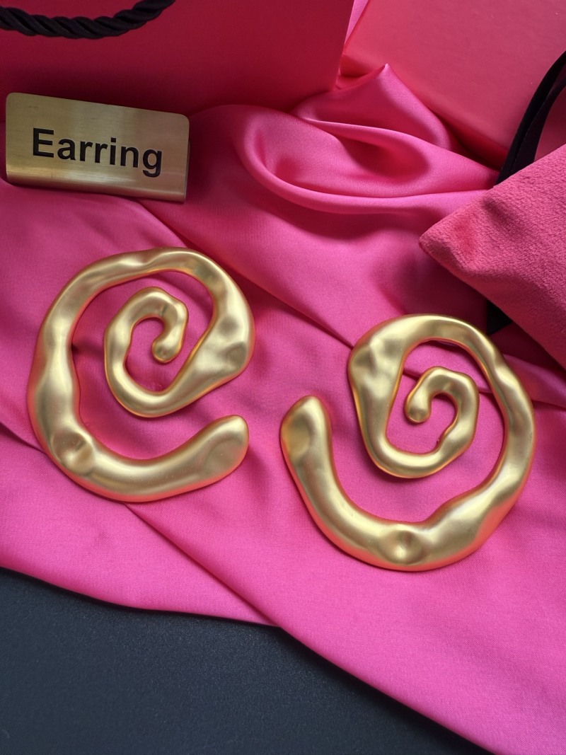 Золотистые серьги в виде спиралей Schiaparelli