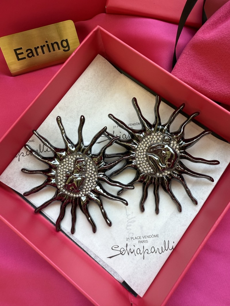Серьги в форме солнца с лицом Schiaparelli