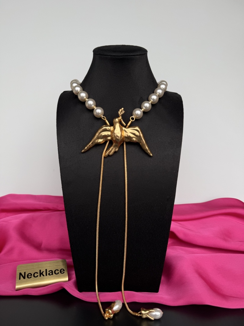 Набор из бус и колье с птицей Schiaparelli