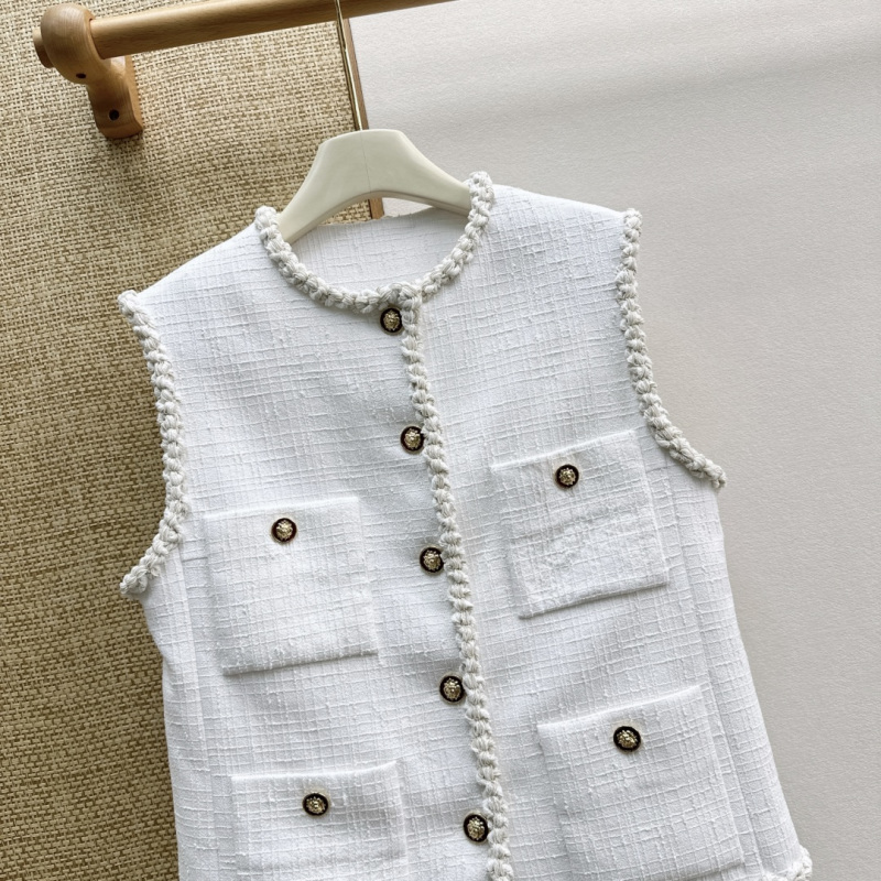 Жилеты Chanel