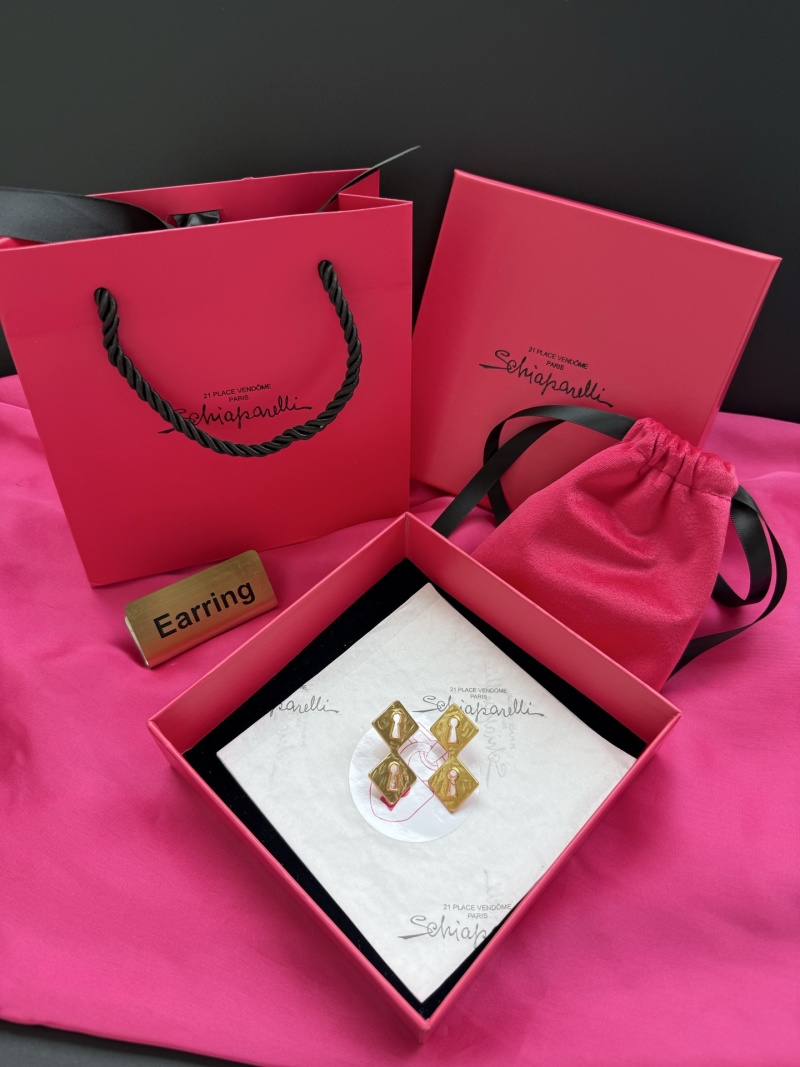 Серьги с ключом Schiaparelli