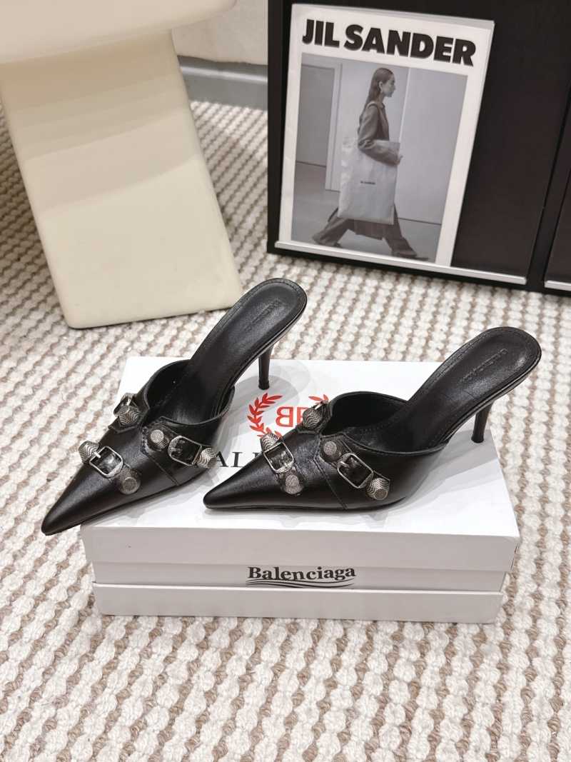 Черные кожаные мюли с заостренным носом и декоративными пряжками Balenciaga