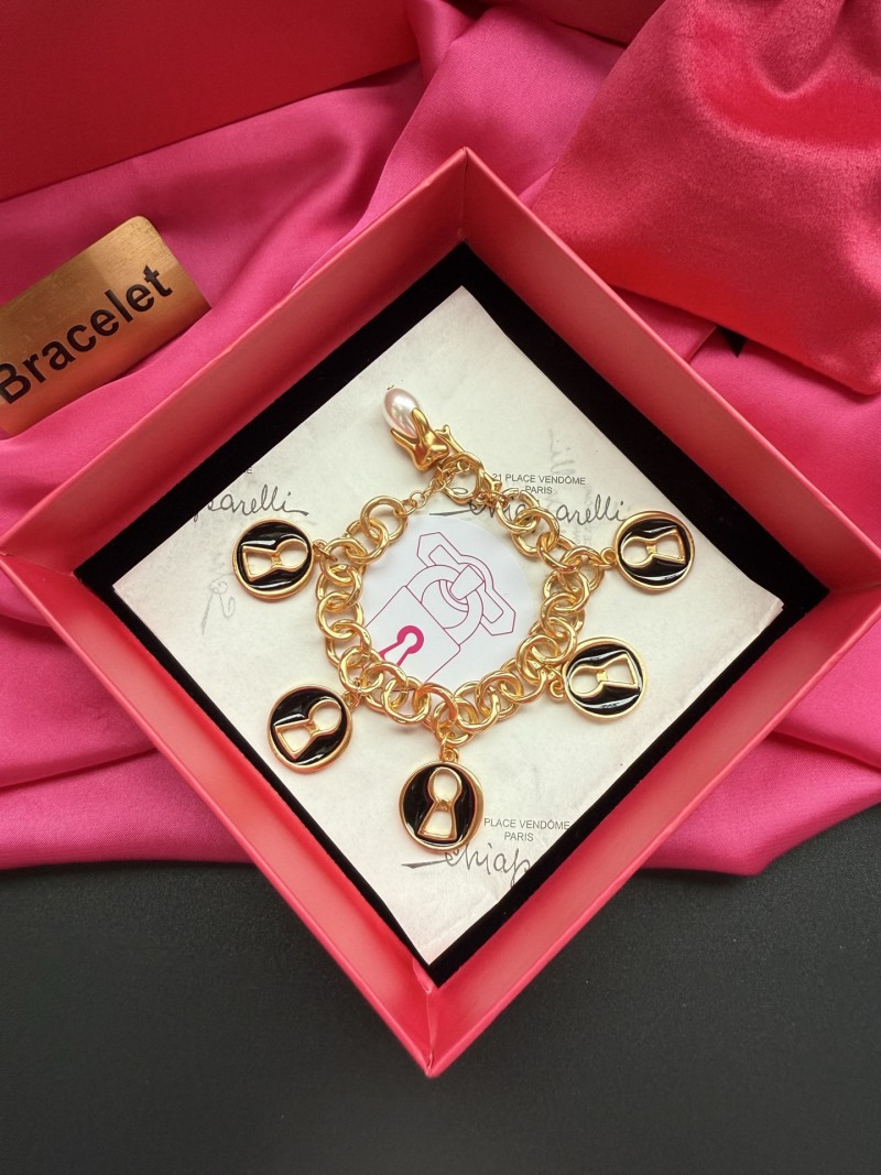 Браслет с подвесками Schiaparelli