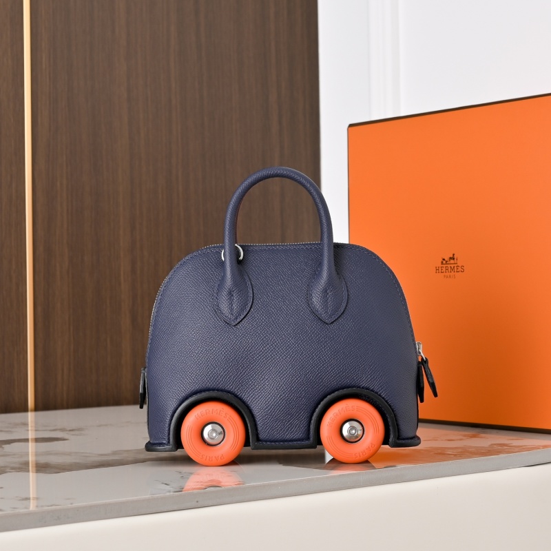 Синяя сумка с колесами, кожаная Hermès