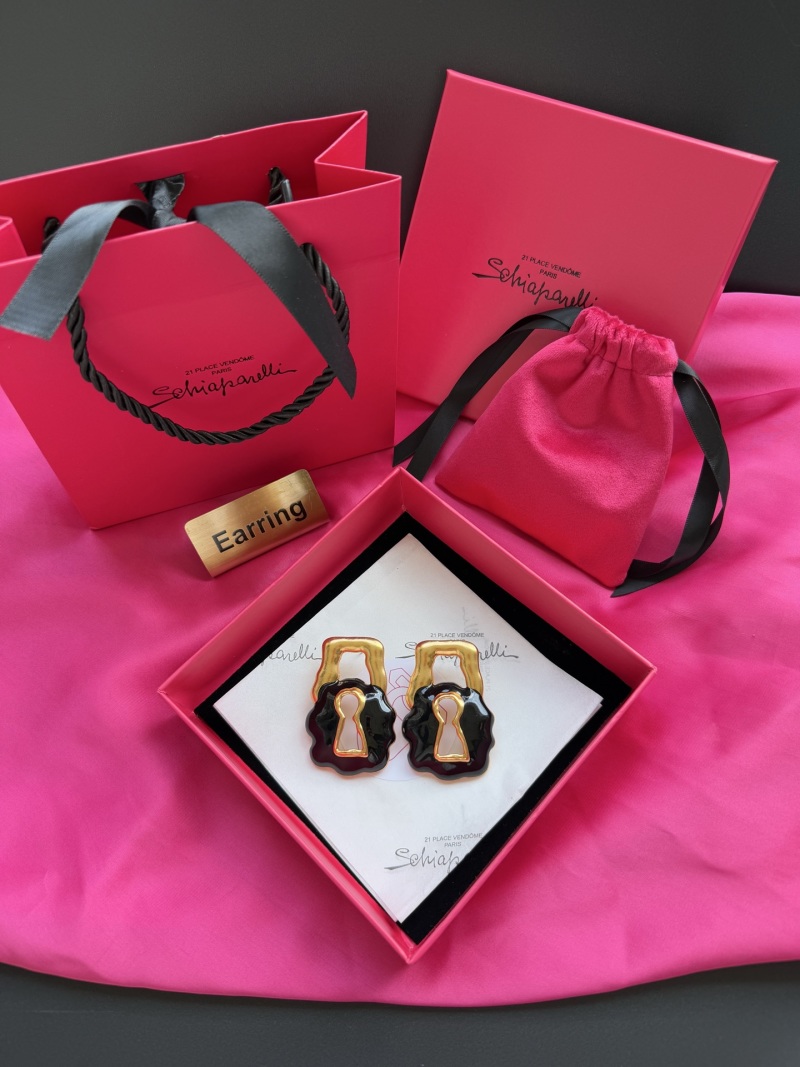 Серьги в виде замков Schiaparelli