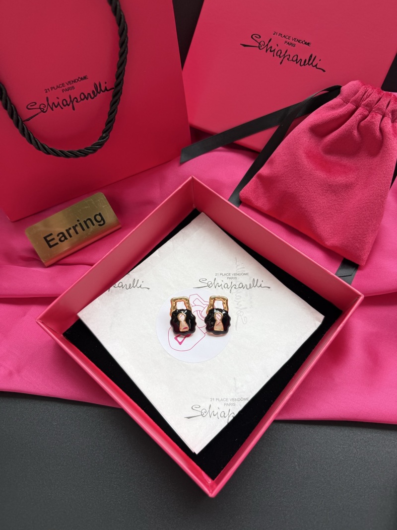 Серьги в виде замков Schiaparelli