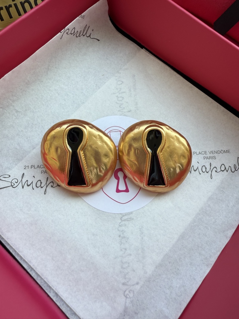Серьги в форме ключа Schiaparelli