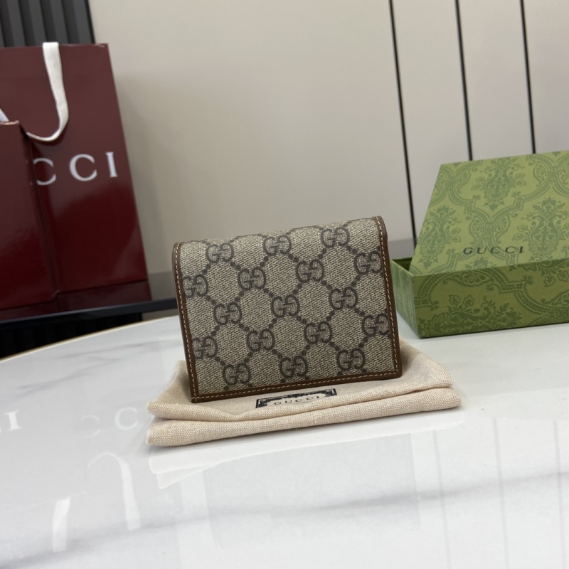 Кошелек Gucci с принтом GG и фурнитурой