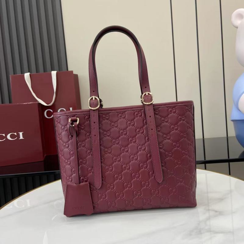 Сумка-тоут Gucci бордовая с тиснением