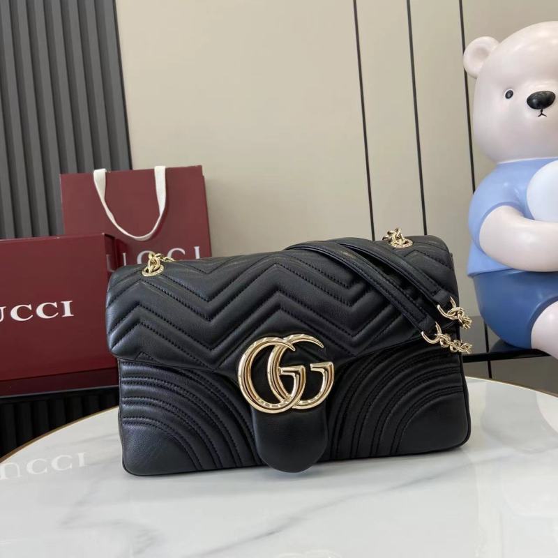 Черная сумка Gucci с золотой фурнитурой