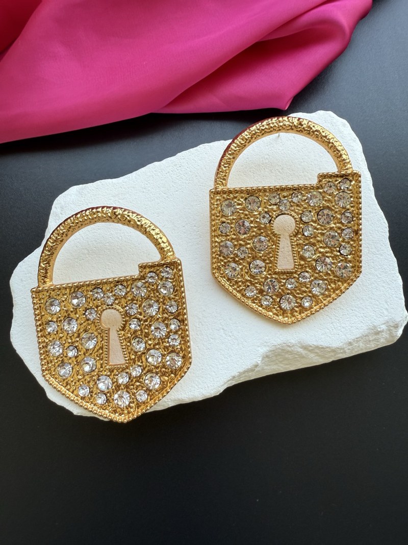 Серьги в виде замков с кристаллами Schiaparelli